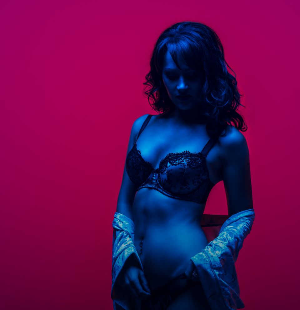 woman in lingerie in blue light