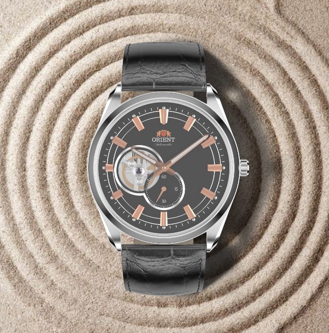 oritent cgi wristwatch surrounding by grains of sand