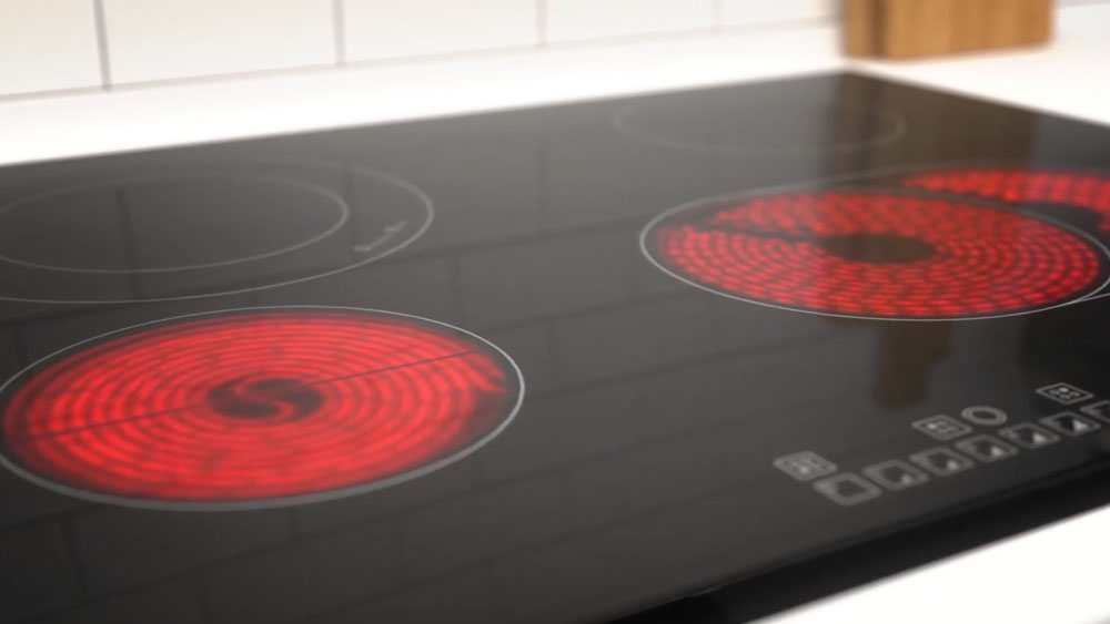 4 hob cooker with 2 hobs illuminated